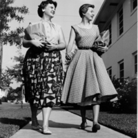 Two female Rice students outside the Banks Street Apartments