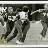 Female students playing Powderpuff football, Rice University
