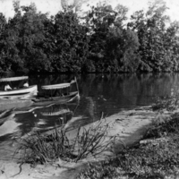 Electric boats on Buffalo Bayou carrying the HY&amp;PBC burgee
